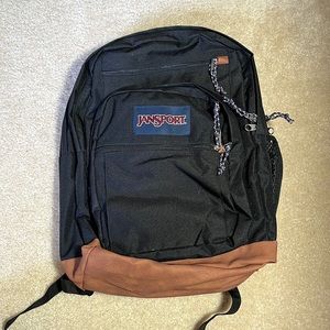 black and brown jansport backpack